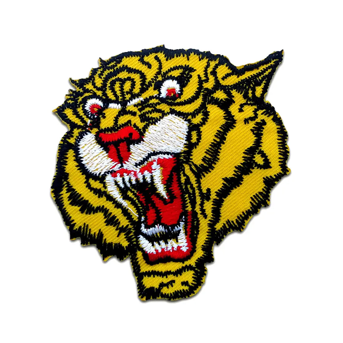 An embroidered patch of a yellow tiger growling with an open mouth