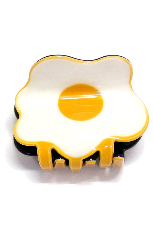 white & yellow plastic fried egg shaped claw style spring tension hair clip