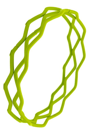 set of three metal bangles in a wavy zig-zag shape with a lime green matte soft-touch coating