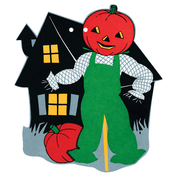 A scarecrow with green overalls and a jack-o’-lantern standing in front of a house