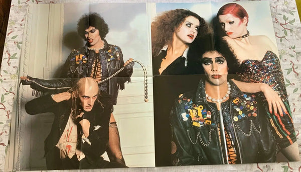 A poster of Frank N. Furter with Riff Raff and a poster of Frank N. Furter with Magenta and Columbia