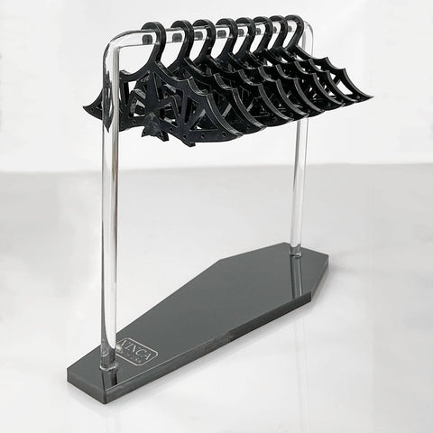 acrylic "Hang in There!" dresser top earring holder stand with eight shiny black laser cut bat-shaped hangers and coffin shaped base