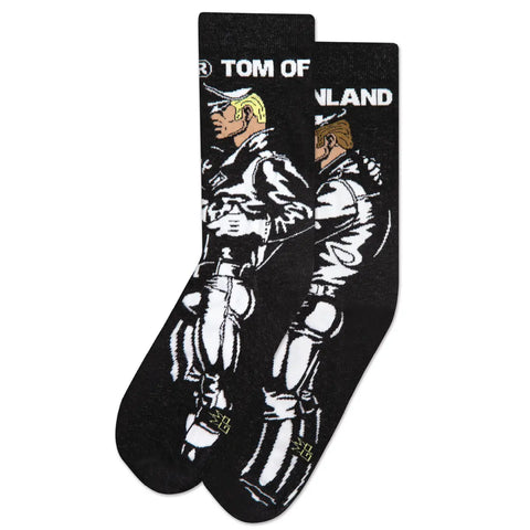 A pair of black crew socks with the Tom of Finland logo wrapped around the cuff & images of two different leather daddy style characters down the length of the sock 
