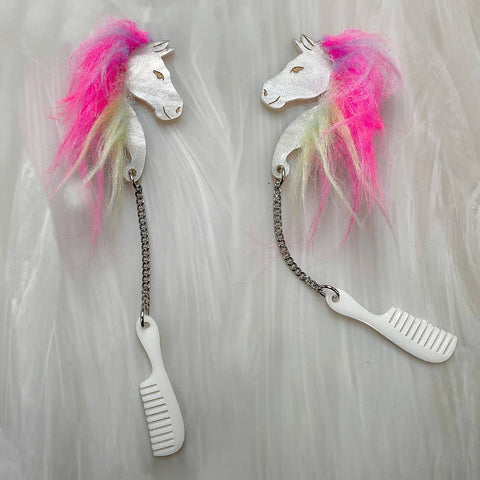 pair pearly white acrylic horse head post earrings with metallic gold details, hand-adhered faux fur mane, and matching dangling comb charm on stainless steel chain
