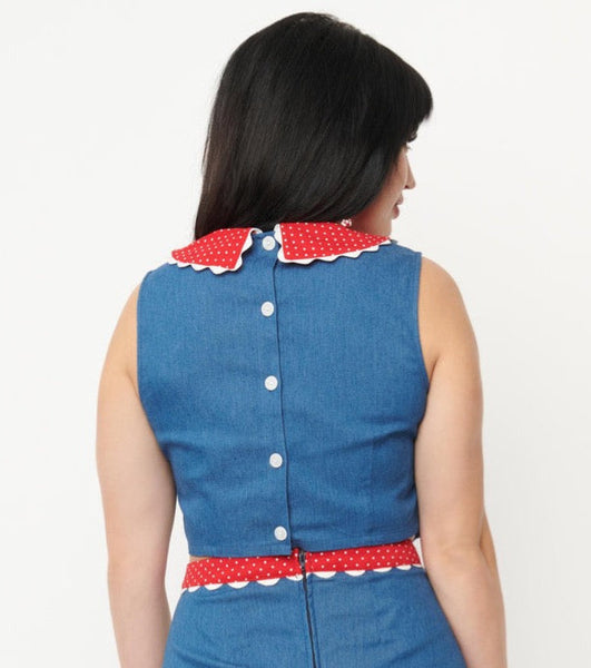retro style shell top in stretch faux denim with a red and white dotted collar and white ric rac trim detail, showing button up back view on model on model