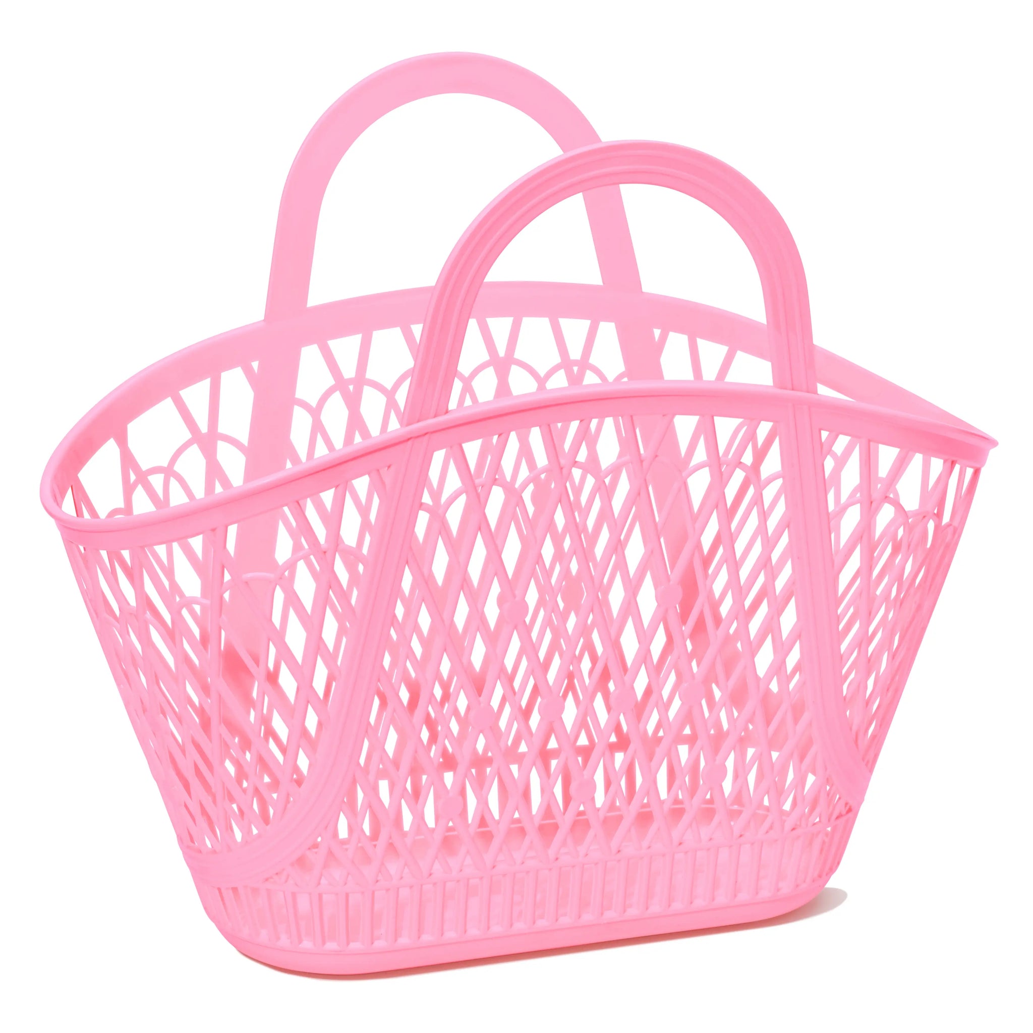 A large bubblegum pink rounded handle bag in a market basket style with a criss-cross pattern and flat base