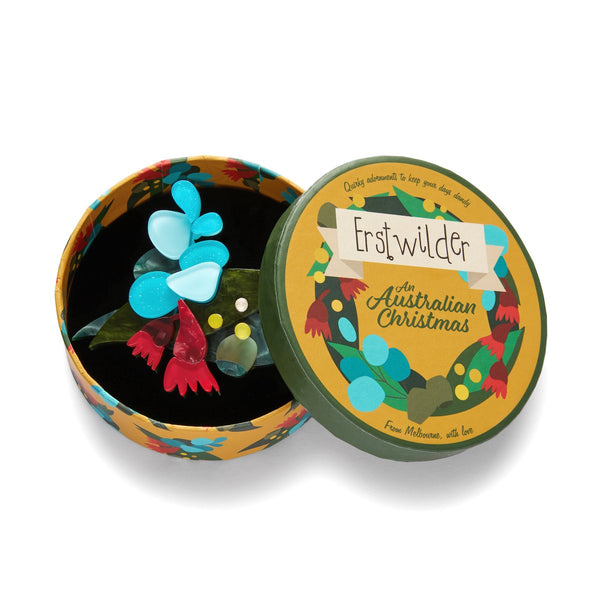 An Australian Christmas Collection "Christmas Holly-Days" layered resin brooch, shown in illustrated round box packaging
