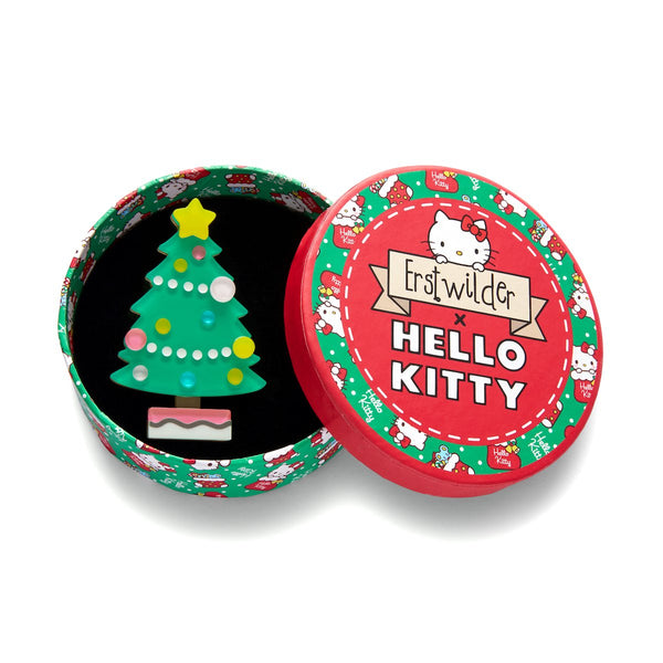 Hello Kitty Christmas Collection "Under the Tree" decorated Christmas tree layered resin brooch, shown in illustrated round box packaging