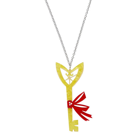 layered resin golden yellow key with red ribbon pendant on silver metal chain necklace
