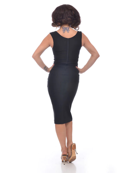 sleeveless black wiggle dress featuring a surplice sweetheart neckline with underbust seam and vertical waist darting, shown back view on model