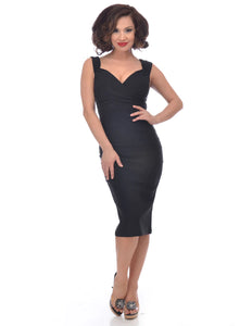 sleeveless black wiggle dress featuring a surplice sweetheart neckline with underbust seam and vertical waist darting, shown on model