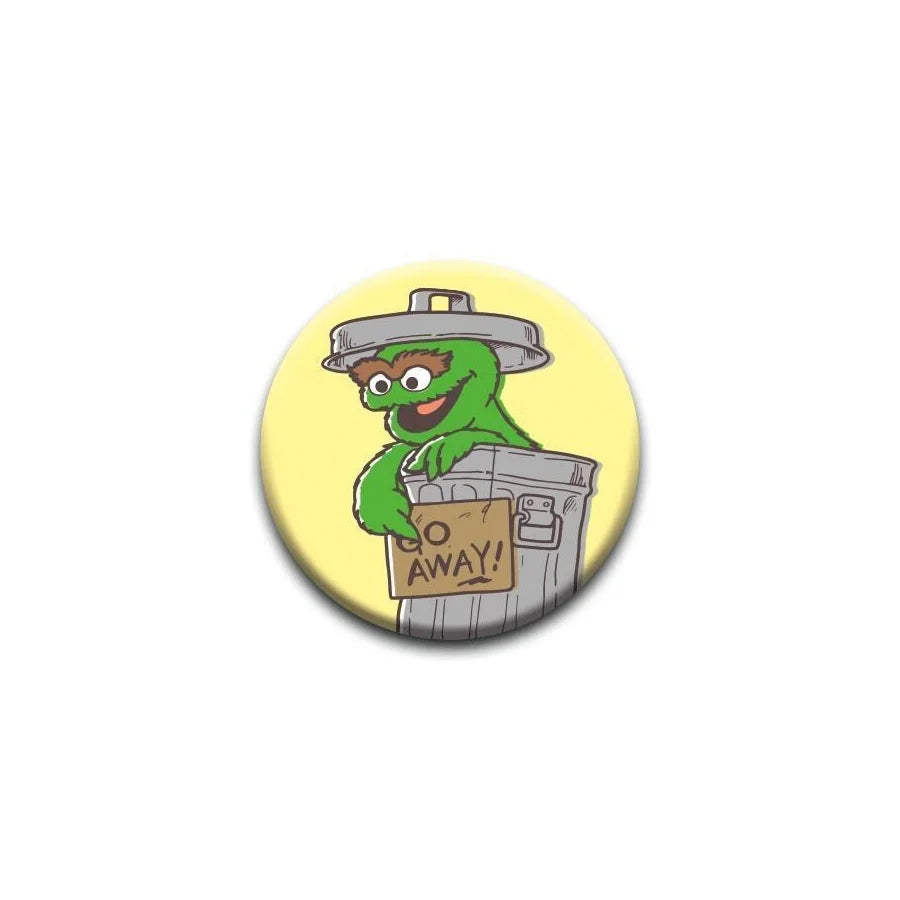 The character Oscar the Grouch from Sesame Street in his garbage can pointing to a sign that says “GO AWAY” on a 1.25” button