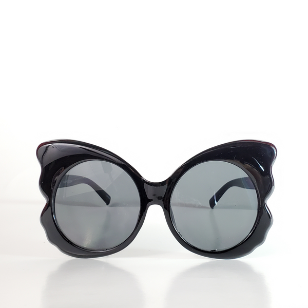 shiny black plastic butterfly shaped frame sunglasses with round dark smoke lens 