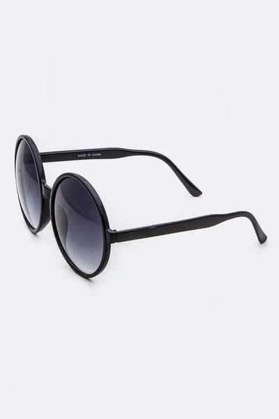 Large 3" round black plastic frame gradient smoke lens sunglasses, shown 3/4 view