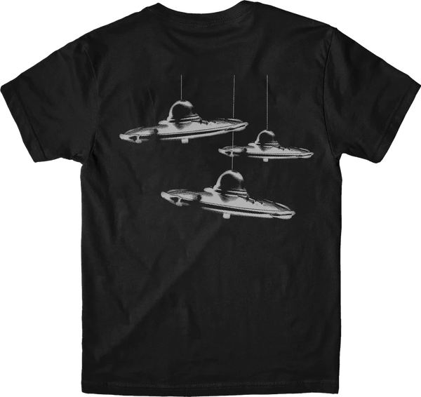 three flying saucers printed in white on back of black cotton t-shirt