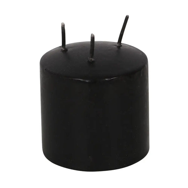A small black pillar candle that drips bloody red when lit. Shown unlit