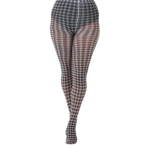 Very soft & stretchy opaque tights in a classic black & white houndstooth print. Shown on a model in a straight ahead shot
