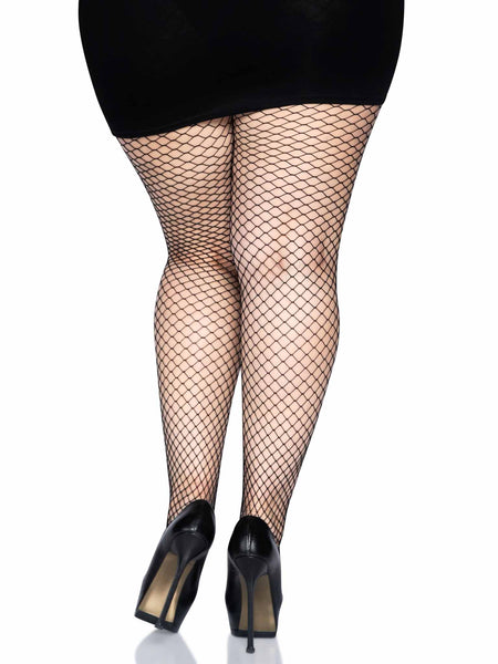 bold industrial fishnet pantyhose in black, shown back view on model 