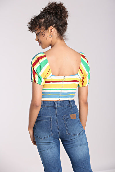 A model wearing a short sleeved crop top with horizontal stripes in white, red, light blue, yellow, and seafoam green. It has a fitted bodice with tie detail and elasticized sweetheart neckline. Shown from behind to feature the zip back closure