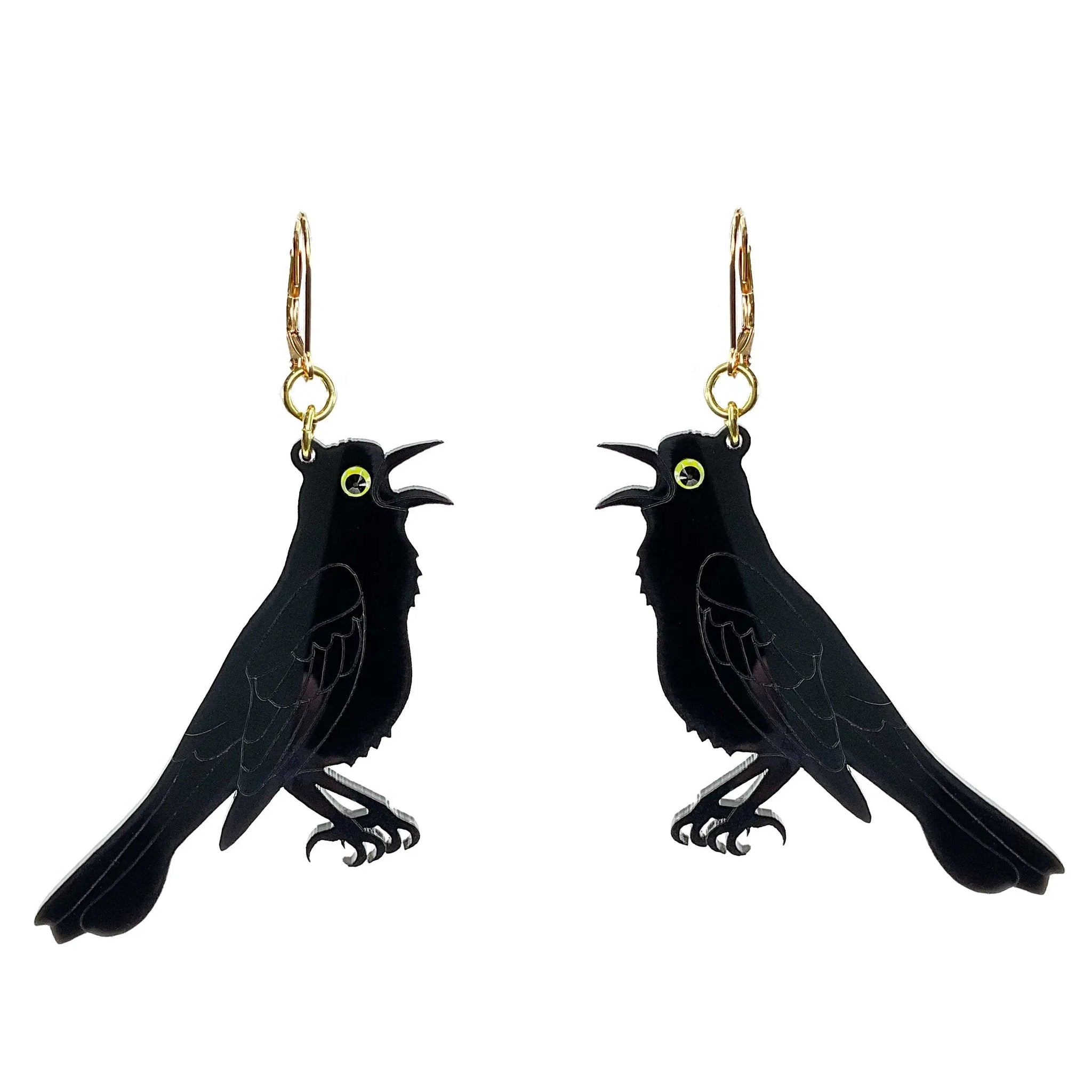 A pair of dangle earrings of two black grackle birds facing opposing sides with beady yellow eyes