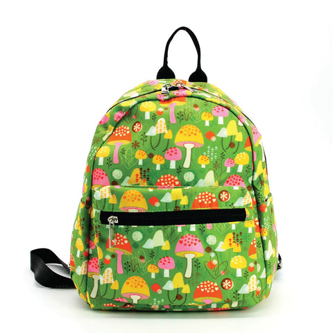 A mini backpack with a print of colorful yellow, pink, and red toadstool mushrooms on a bright green background. It has black straps and a black handle & zippered front pouch