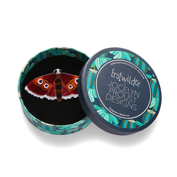 Jocelyn Proust Collaboration Collection "Fluttering Bogong" layered resin moth brooch, shown in illustrated round box packaging