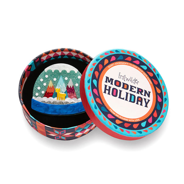 Modern Holiday Collection "It's Cold Outside" layered resin snowdome brooch, shown in illustrated round box packaging