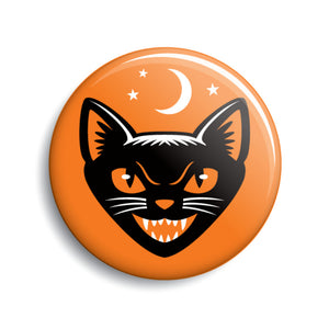 illustrated black cat face against orange background 1 1/2" round metal pin-back button