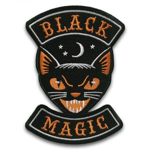 4 5/8" black cat with orange text "Black Magic" rockers embroidered iron or sew on patch