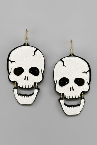 pair acrylic black and white skull dangle earrings