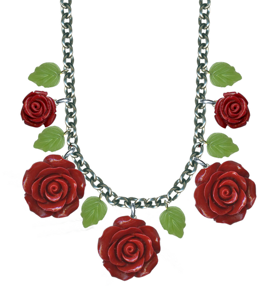 5 red resin rose alternating with 6 green glass leaf pendants on 17" silver plated chain necklace, shown close-up