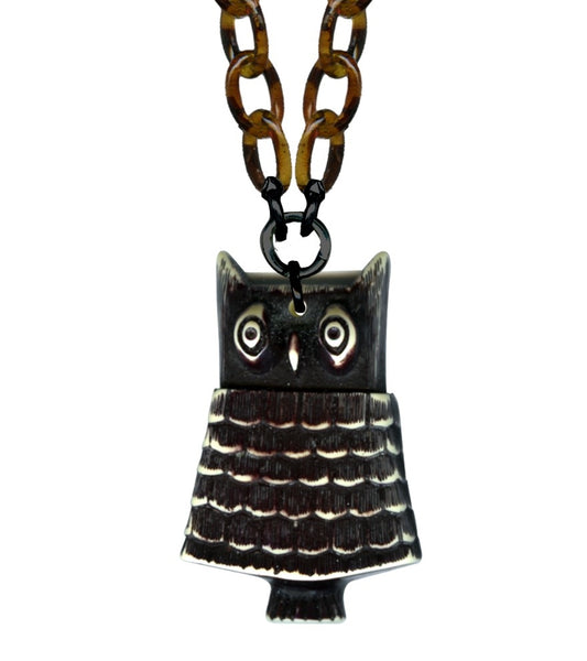 distressed brown & ivory Retrolite 2 1/8" stylized owl pendant on 17" tortoiseshell plastic link chain, close-up