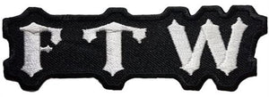 Black & white embroidered uppercase "F T W" Gothic script patch
