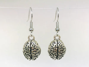 A pair of small silver metal brain charms as a set of dangling earrings