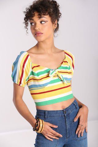 A model wearing a short sleeved crop top with horizontal stripes in white, red, light blue, yellow, and seafoam green. It has a fitted bodice with tie detail and elasticized sweetheart neckline.