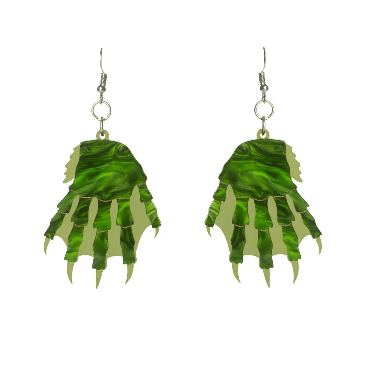 A pair of laser-cut hand layered acrylic dangle earrings In the shape of the Creature from the Black Lagoon’s claws. With marbled green with matte green webbed claws & engraved and hand painted gold detailing.