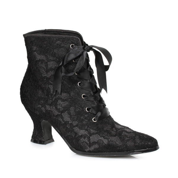 pointed toe curvy heeled ankle boot features floral black lace overlay on padded black fabric body, and is finished with satin piping and ribbon laces, shown 3/4 view