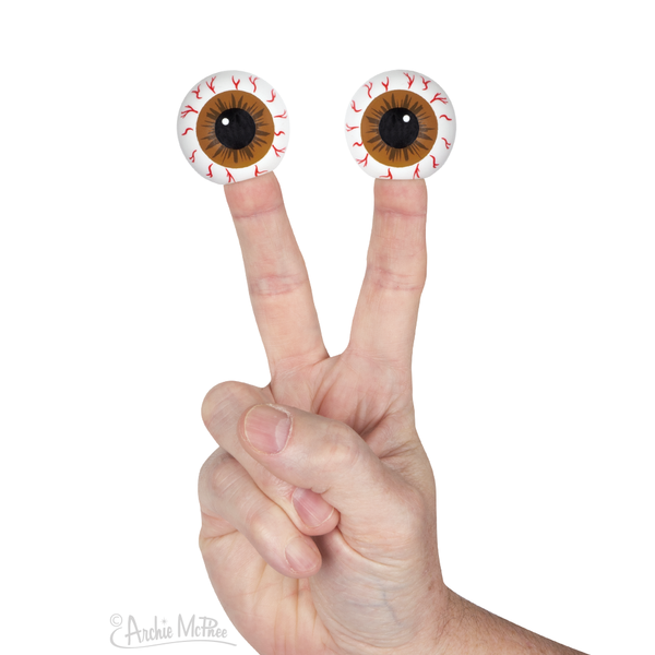 two 1 1/2" vinyl bloodshot brown iris eyeball finger puppets, shown on a hand