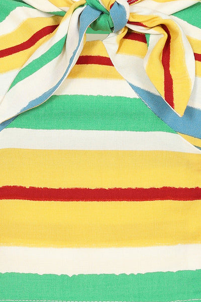 Close up shot of a short sleeved crop top with horizontal stripes in white, red, light blue, yellow, and seafoam green. It has a fitted bodice with tie detail and elasticized sweetheart neckline. 