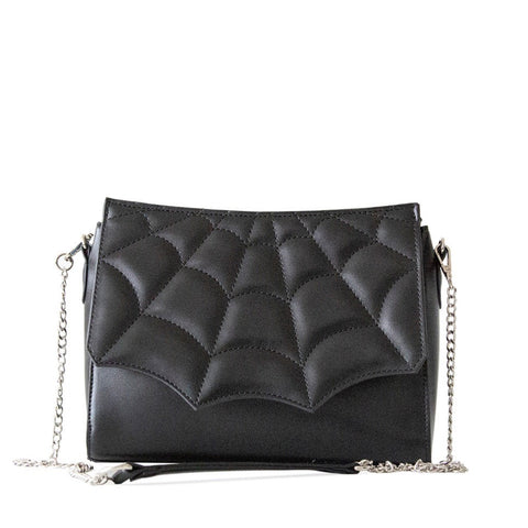 A matte black vinyl purse with quilted spiderweb front flap and a chain handle 