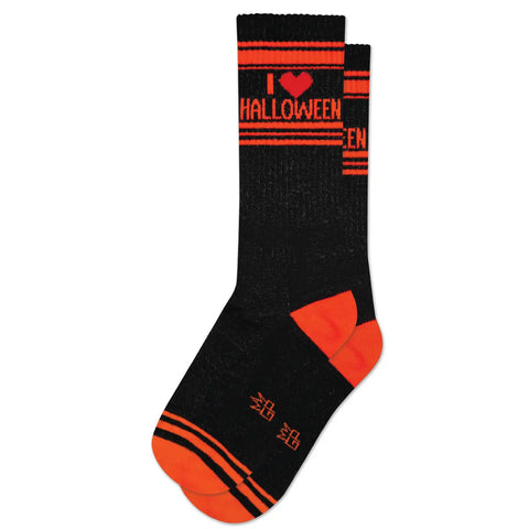 A pair of black ribbed crew socks with red banding at the tops and toes of the socks & red ankles. The message “I ❤️ Halloween” is written on the sides of the socks