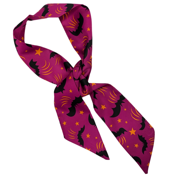 purple background allover black bats and golden orange stars print 1.75" x 36" skinny polyester twill scarf