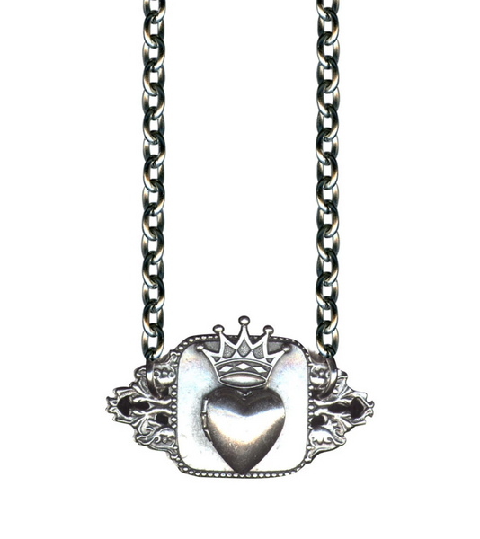 silver metal crowned heart locket mounted on 1/5" x .75" decorative plaque pendant on sturdy link 17" silver metal chain, cropped close-up