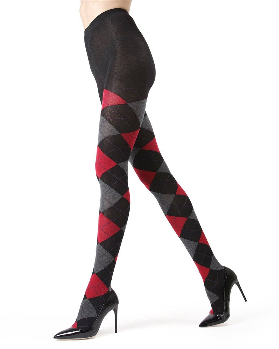 sweater knit tights in a black background argyle pattern with red, grey, and purple, shown on model