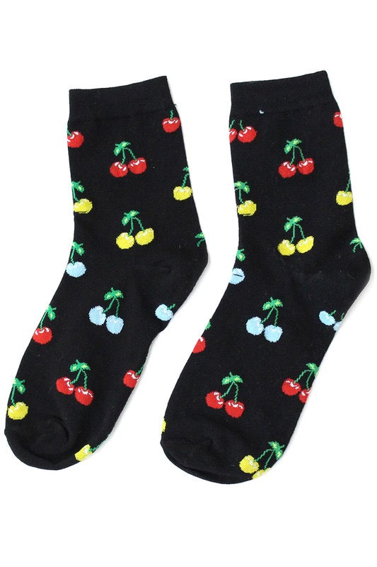 black cotton knit ankle socks with an all-over pattern of bright red, yellow, and blue cherries with green stems