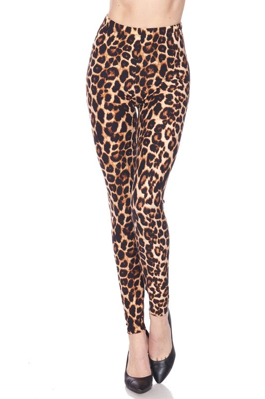 High-waisted super stretchy brushed fiber (soft like the skin of a peach!) leggings in a classic leopard print. Shown on a model from the front