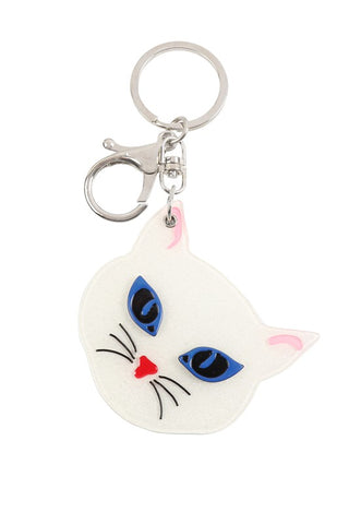 Glittery white resin blue-eyed kitty face keychain that slides open to reveal a mirror