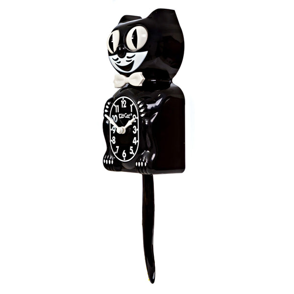 black & white Kit-Cat wall mount clock features a mischievous grin, and big round eyes that swivel side-to-side in time with its pendulum tail 