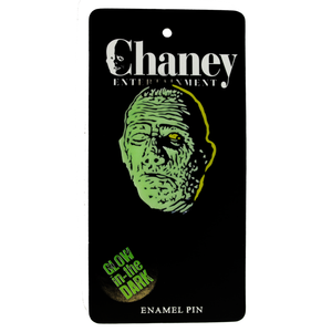 The Mummy glow-in-the-dark enamel pin features Lon Chaney, Jr., as Kharis in the 1942 horror classic, The Mummy's Tomb, shown on illustrated black backer card packaging