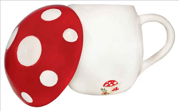 red & white hand-painted ceramic toadstool mushroom shaped lidded 12 oz. mug, shown with lid propped against the side